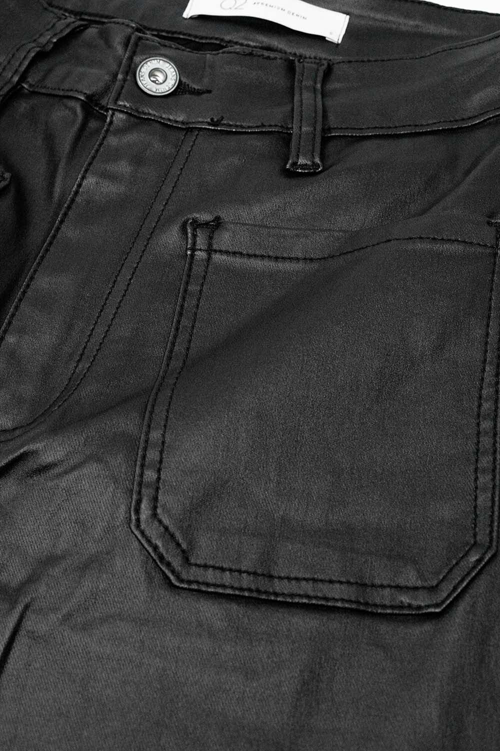 Faux leather pants with wide leg and pocket detail
