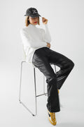 Faux leather pants with wide leg and pocket detail