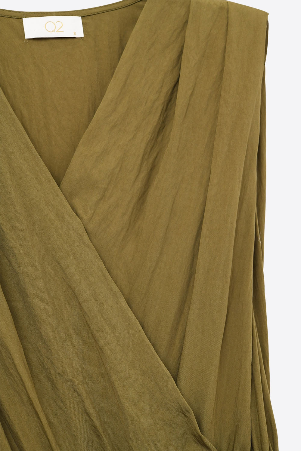 draped olive jumpsuit in crinkled fabric