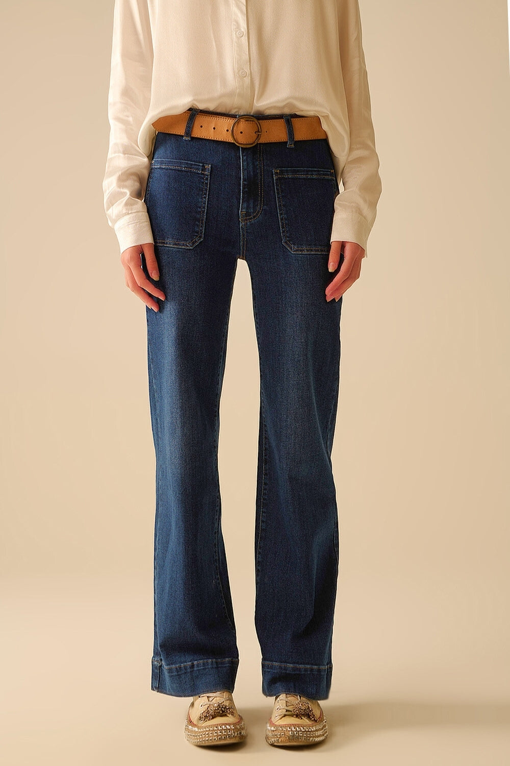 Dark wash jeans with wide leg and pockets