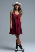 Burgundy poplin mini dress with a big bow detail