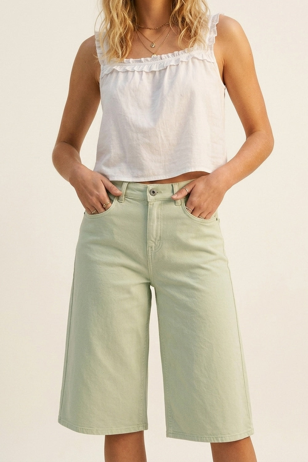 Stretch-denim Bermuda shorts in Mint Green