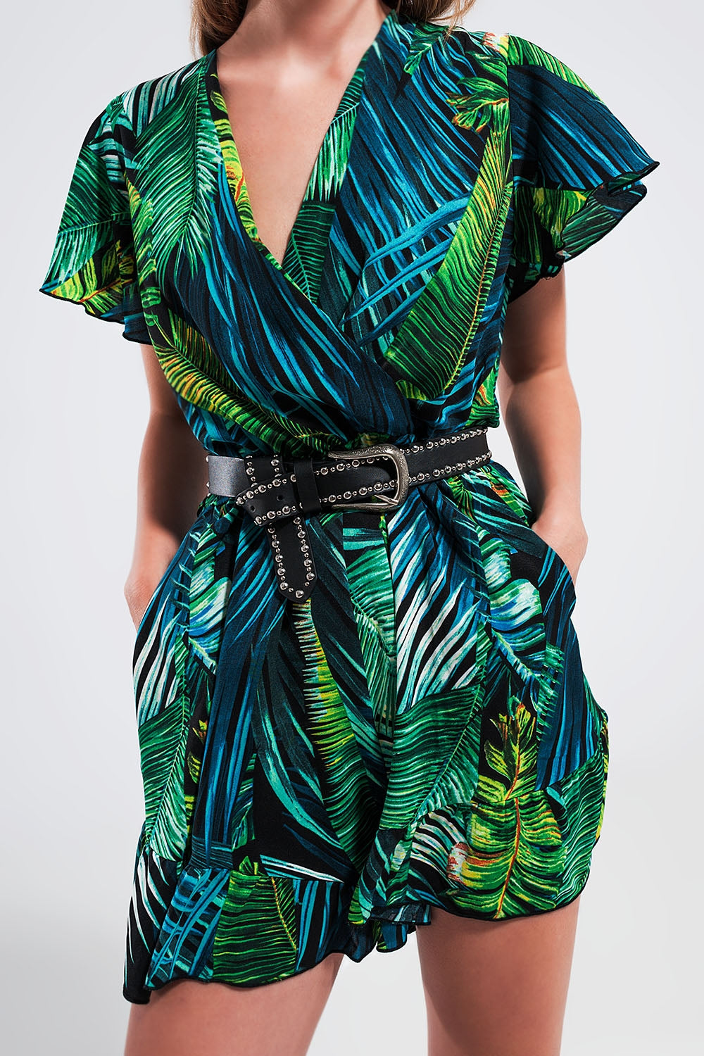 Wrap jumpsuit in green tropical print